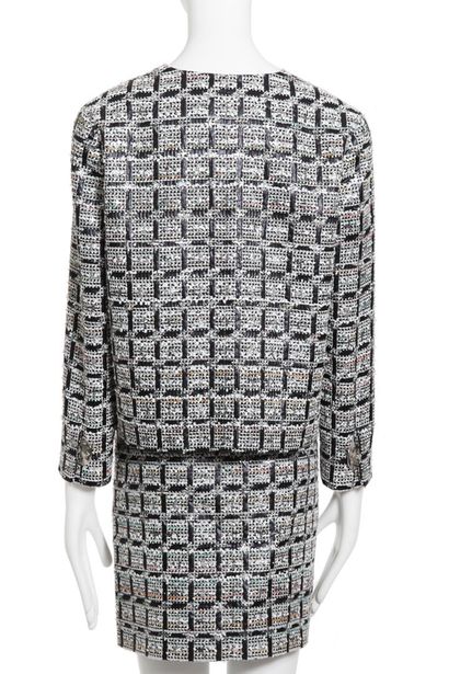 CHANEL A Chanel fantasy-tweed suit, Spring-Summer 2016,

A Chanel fantasy-tweed suit,...