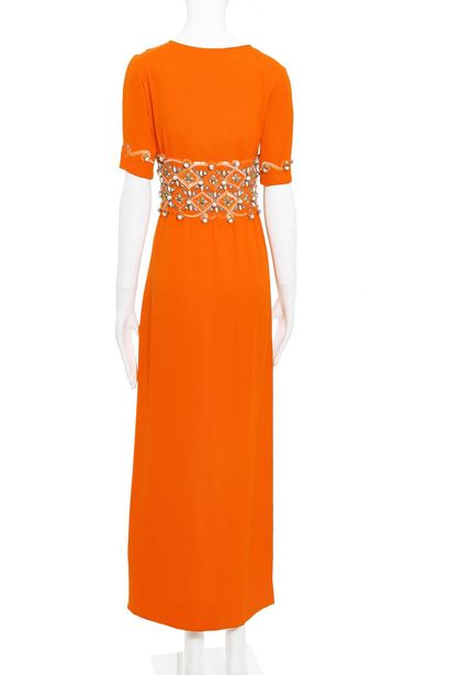 CARVEN A Carven couture orange silk-crepe evening gown, circa 1965,

A Carven couture...