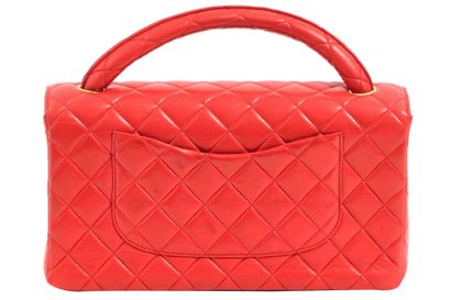 CHANEL A Chanel red quilted lambskin leather bag, 1991-94

A Chanel red quilted lambskin...