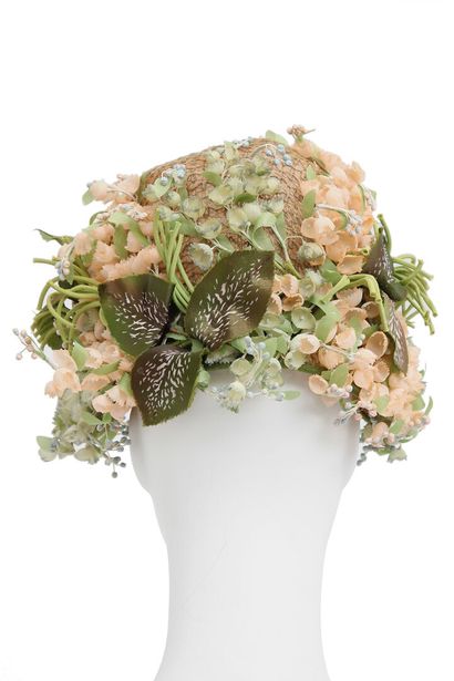 DIOR A Miss Dior floral hat, circa 1960

A Miss Dior floral hat, circa 1960

labeled,...