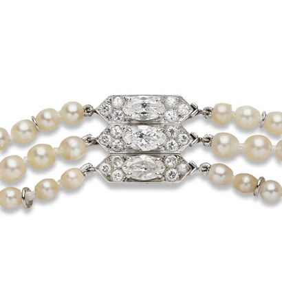 Collier perles fines et diamants, par Chaumet 
A three strands of falling pearls...