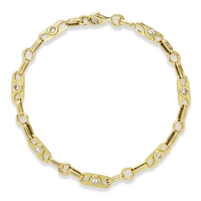 null Gold bracelet



with fancy links in 18K (750) gold, punctuated with small round...