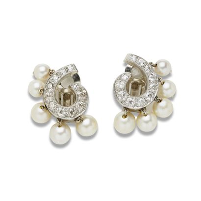 Pair of cultured pearl and diamond earrings



Set...