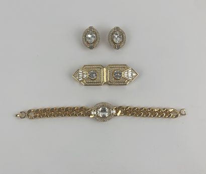 CHRISTIAN DIOR 1980's 

Half set including a pair of ear clips, a bracelet and a...
