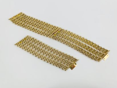 CHRISTIAN DIOR 1980's 

Suite of three gold-plated metal bracelets, convertible into...