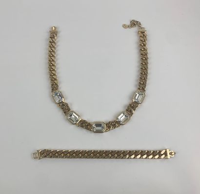 CHRISTIAN DIOR 1980's 

Lot including a bracelet and a necklace in gilded metal mesh...