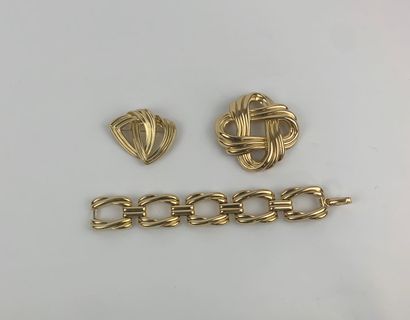 CHRISTIAN DIOR 1980's 

Lot including two brooches and a gilded metal bracelet

Marked...