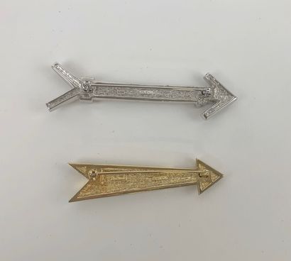 CHRISTIAN DIOR 1980's 

Two silver and gold metal and rhinestone arrow brooches marked...