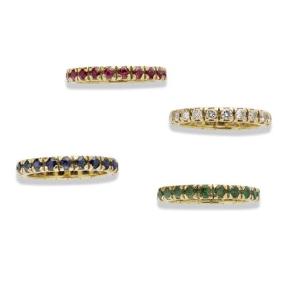 null Four American sapphire, emerald, ruby and diamond wedding rings

Set with small...