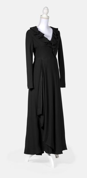 Ted LAPIDUS Long evening dress in black viscose and satin, a belt covered with black...