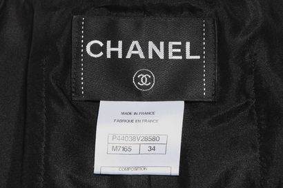 CHANEL Fancy tweed suit, modern

labeled, size 34, the jacket with two pockets and...