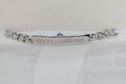 DOLCE & GABANNA Manteau en laine ivoire, moderne



labelled, the pockets with padlock...