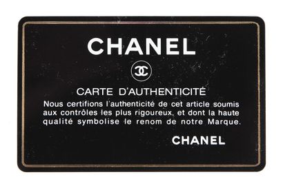 CHANEL Sac du soir en satin noir matelassé Chanel, milieu des années 1990





stamped,...