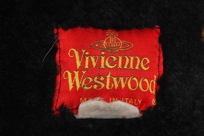 VIVIENNE WESTWOOD Veste en agneau retourné noir, circa 1994,



yellow on red label,...