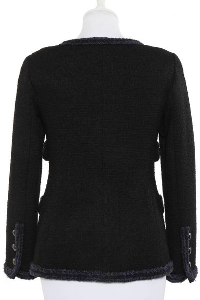 CHANEL Veste à boutonnage simple en laine bouclée noire, moderne

labelled, size,...