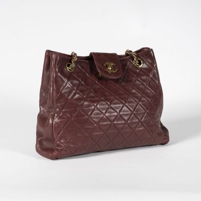 CHANEL Bag, probably 1990s

stamped, indistinct serial number, in quilted bordeaux...