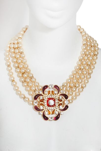 CHANEL Four strands of imitation pearls necklace, circa 1991,

signed, central medallion...