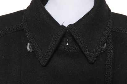 CHANEL Coat, modern

labelled, size 46, in black cashmere edged with braid, double...