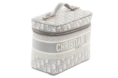 CHRISTIAN DIOR Vanity bag, modern,

signed, in monogrammed canvas, 23cm, 9in long...