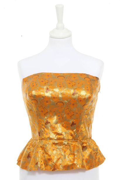 null Couture evening bustier,1940s, 

un-labelled, with printed stylized faces, lightly...