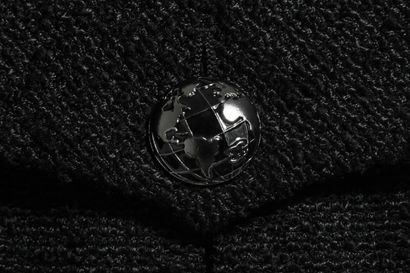 CHANEL Black single breasted jacket, modern

labelled, size, with enamelled 'globe'...
