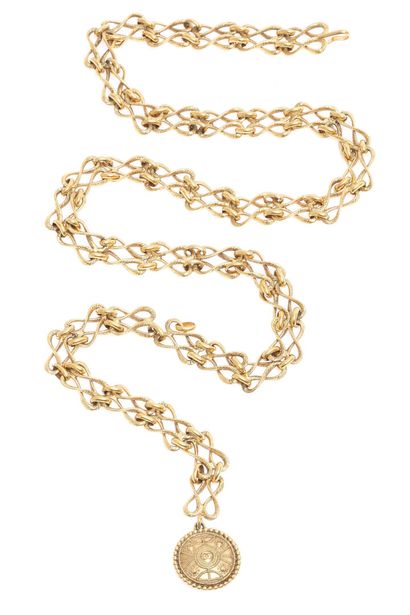 CHANEL Chain belt, 1980s-90s,

signed, with twisted links, singular medallion with...