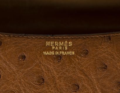 HERMES Constance 23 bag, 1972,

signed, blind stamp B, in dark brown ostrich leather...