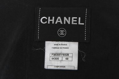 CHANEL Coat, modern

labeled, size 48, double-breasted, gilt chain buttons, tie-belt,...