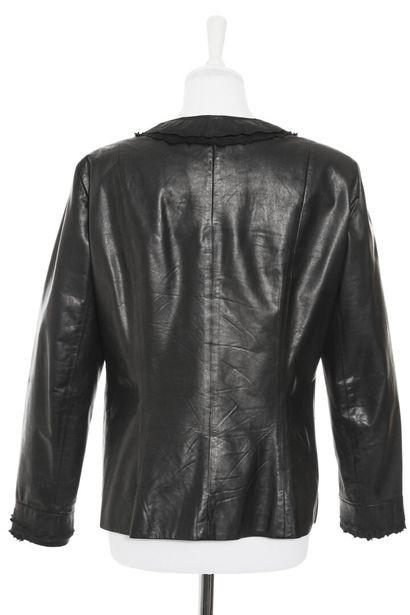 CHANEL Veste en cuir noir, circa 2013

labelled, size 46, with burnt-effect edges,...
