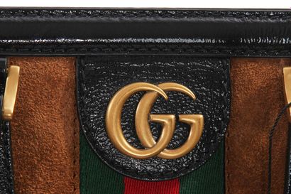 GUCCI Sac "ReBelle", moderne, 



stamped, in brown suede,with signature stripe and...