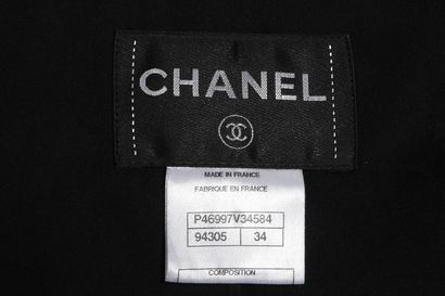CHANEL Black single breasted jacket, modern

labelled, size, with enamelled 'globe'...