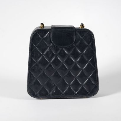 CHANEL Navy blue quilted leather vanity bag, late 1980s-early 1990s,

with woven...