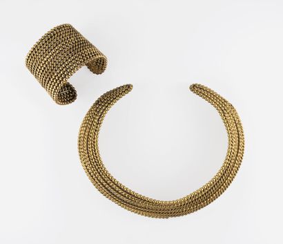 ATTRIBUE A YVES SAINT LAURENT Necklace and cuff bracelet, in suite, in metal decorated...