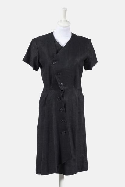 SAINT LAURENT Rive Gauche Black linen dress with asymmetrical buttons, lined
Size...