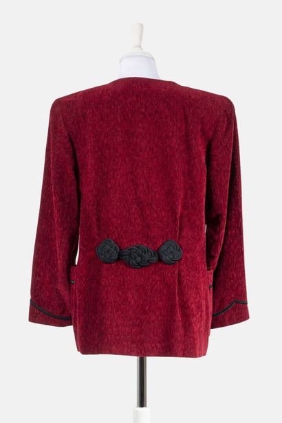 YVES SAINT LAURENT VARIATION Red velvet jacket with brandebourgs, passementerie martingale.
Size...