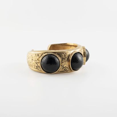 null Open cuff bracelet in gold-plated metal decorated with flowers and three cabochons...
