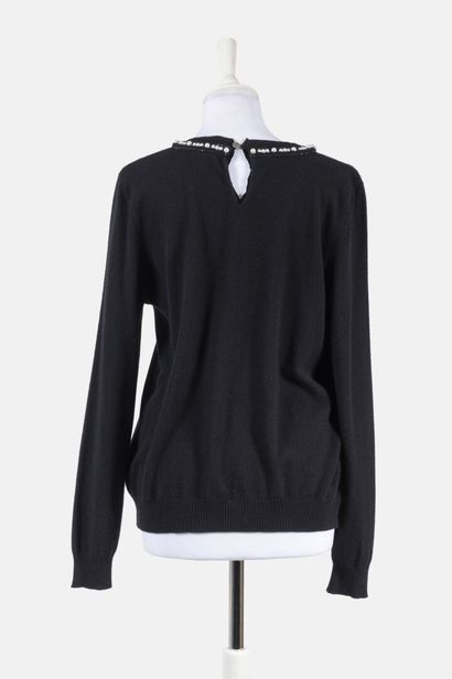 CHANEL Black cashmere sweater, the collar is embellished with white fancy pearls,...