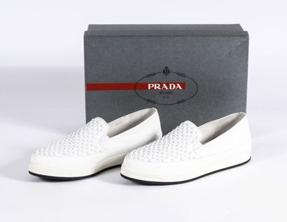 PRADA Pair of white leather slippers with white metal diamond tips
Size 38,5

Very...