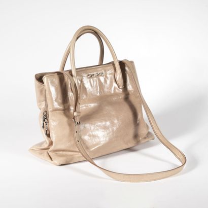 MIU MIU Handbag 34 cm with double handle and shoulder strap, pinkish beige aged effect

Used...