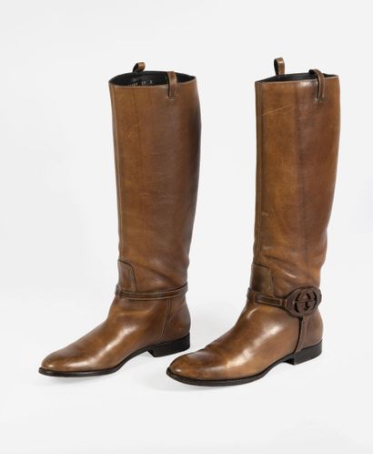 GUCCI Brown distressed leather riding boots with logo on the side, size 40C

Condition...
