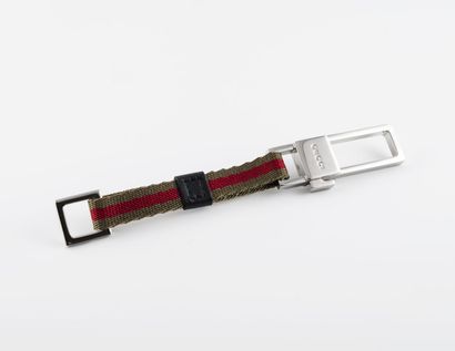 GUCCI Metal keychain with two-tone khaki and red cord
Tags, pouch and box, new c...