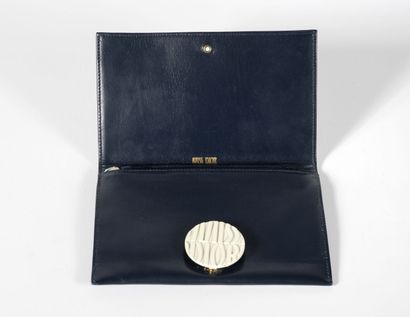 MISS DIOR Clutch bag 13 X19 cm 
In navy blue box, white lacquered metal clasp marked...