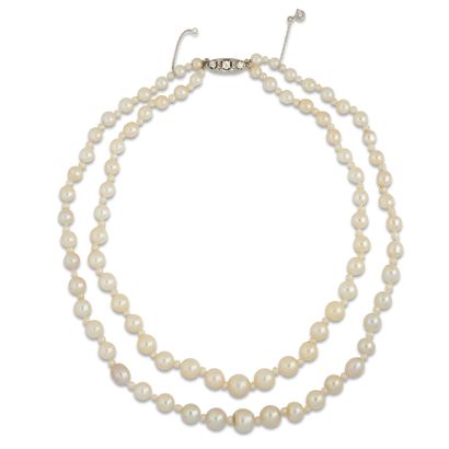 null Collier perles fines, perles culture et diamants

Fait de deux rangs de perles,...