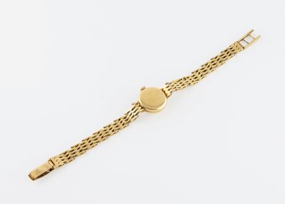 OMEGA Montre bracelet de femme en or, par Omega

Le boitier de forme ronde en or...