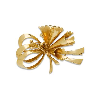 null Broche en or 

En or jaune 18K (750), formant une fleur, poinçon français d'or,...