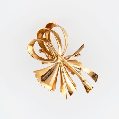 null Broche en or 

En or jaune 18K (750), formant une fleur, poinçon français d'or,...