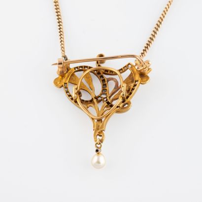 null Pendentif- broche Art Nouveau perles et diamants

En or jaune 18K (750), fait...