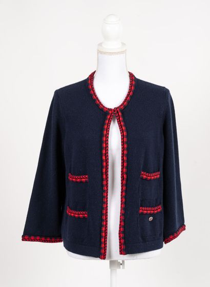CHANEL Navy cashmere vest with tartan edging
Patch pockets, one embellished with...
