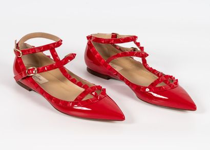 VALENTINO Pair of Rockstud ballerinas 
In red patent leather with diamond tips
Size...