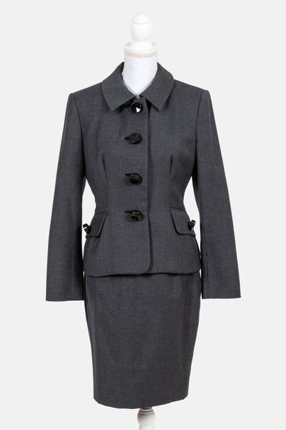 CHRISTIAN DIOR BOUTIQUE Grey virgin wool skirt suit 
Size 40

Good used conditio...